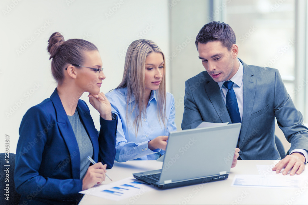 business team with laptop having discussion business team with laptop having discussion