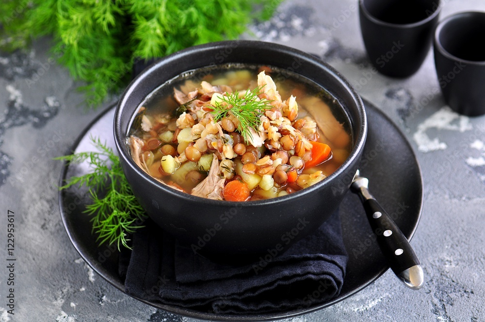 Lentil soup with chicken meat, potatoes, carrots and dill. Lentil soup with chicken meat, potatoes, carrots and dill.