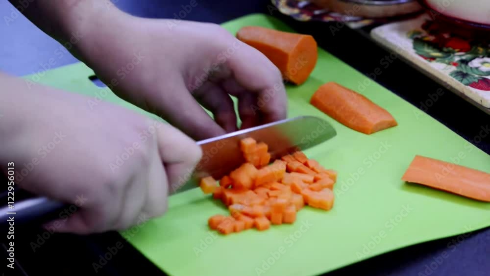 Cutting carrot cubes Cutting carrot cubes