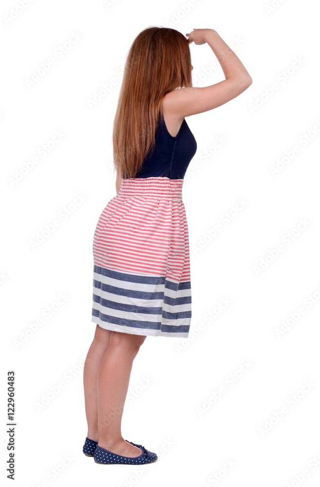 back view of standing young beautiful redhead woman. back view of standing young beautiful redhead woman.