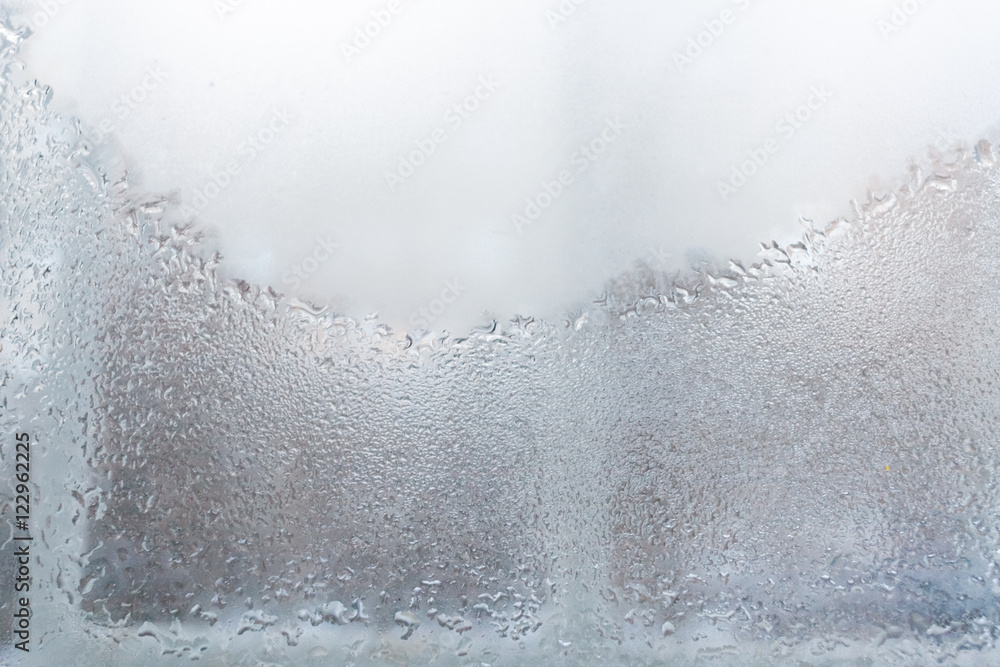 Ταπετσαρία The condensate from the water on a sweaty opaque window glass.