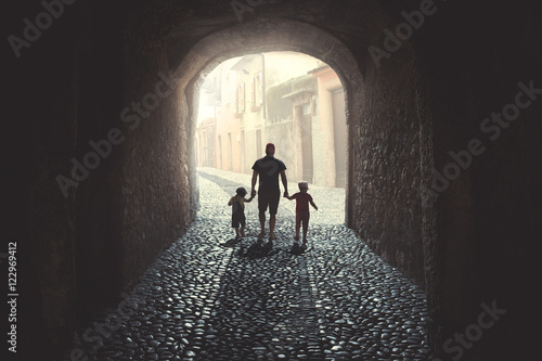 Father walking with children