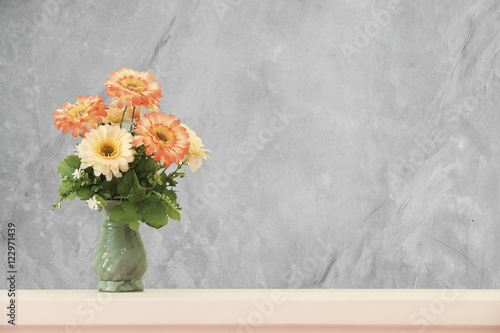 Wallpaper Mural flower in vase on wooden table with cement wall Torontodigital.ca