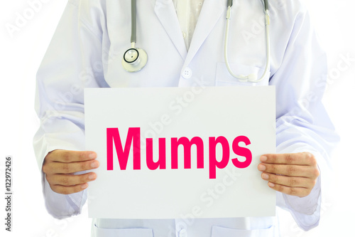 Doctor holding Mumps card in hands
 photo