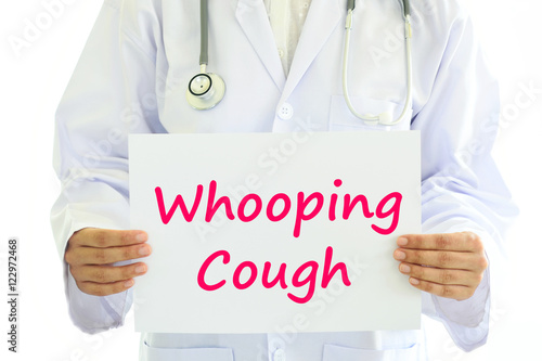Doctor holding Whooping Cough card in hands