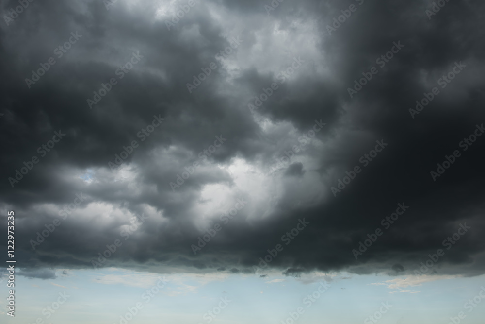 Dark storm cloud layer with blue sky Dark storm cloud layer with blue sky