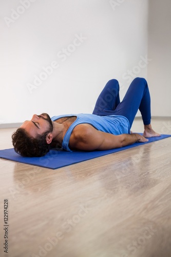 Man performing yoga exercise