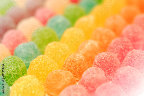 many colorful fruit gelatin in soft focus texture background 