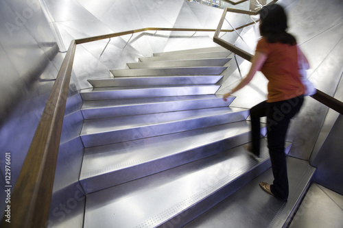 Stainless steel staircase in the entrace to Caixa Forum building, Madrid, Spain, work by Jacques Herzog and Pierre de Meuron. photo