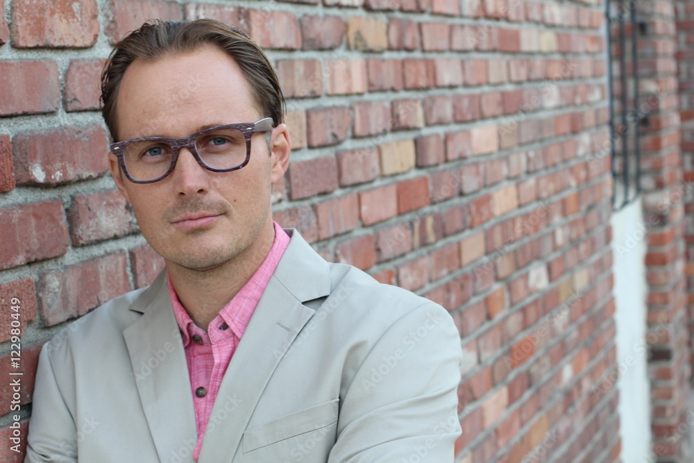 Head shot of businessman wearing glasses - outdoor picture with copy space Head shot of businessman wearing glasses - outdoor picture with copy space