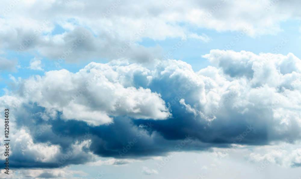 Blue sky background with clouds. Blue hues and outdoor. Blue sky background with clouds. Blue hues and outdoor.
