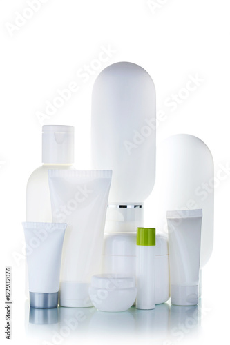 Cosmetic bottles isolated on a white background © 5second