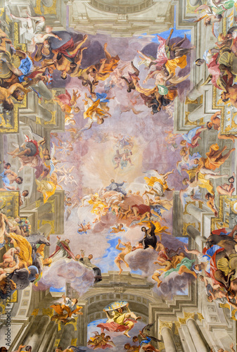 ROME, ITALY - MARCH 10, 2016: The central part of vault baroque fresco The Apotheosis of St Ignatius by jesuit frater Andrea Pozzo (1685) in church Chiesa di Sant'Ignazio di Loyola. photo