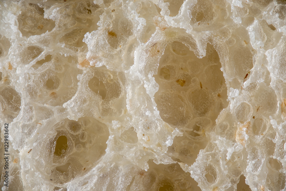 Extreme macro image of white bread background texture