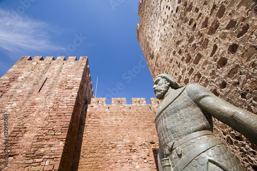 Statue of the king Alfonso III, Castle of Silves, district of Faro, region of Algarve, Portugal photo