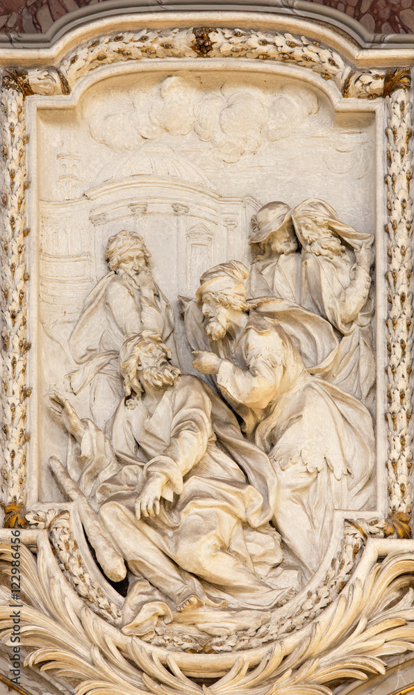 ROME, ITALY - MARCH 10, 2016: The relief of scene from life of St. Thaddeus the Apostle designs by in church Basilica di San Marco Clemente Orlandi (1741).holy