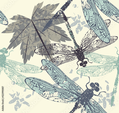 Beautiful seamless pattern with dragonflies, maple leaves and de