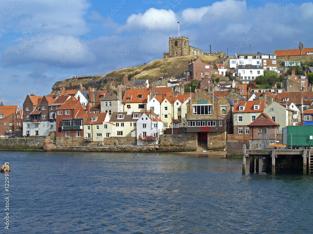 Harbor and skyline in the popular fishing port of Whitby, North Yorkshire, England