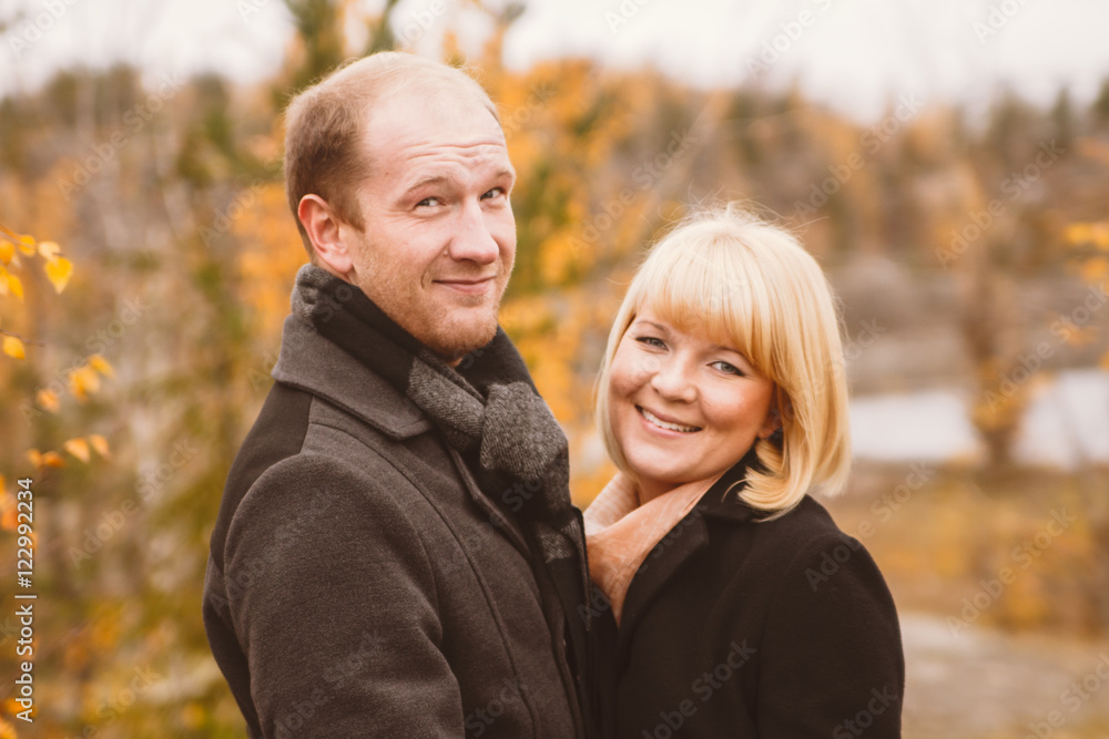 A man and a woman in the autumn Park