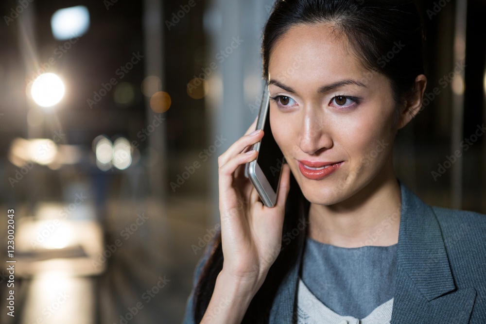 Businesswoman talking on the mobile phone Businesswoman talking on the mobile phone