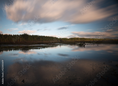 Lake in sweden photographed with long exposure  cloud reflections in the water 