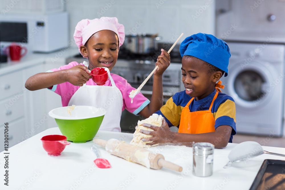 Children preparing cake