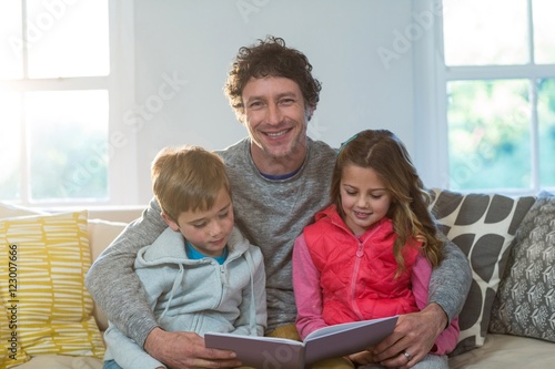 Family reading a book