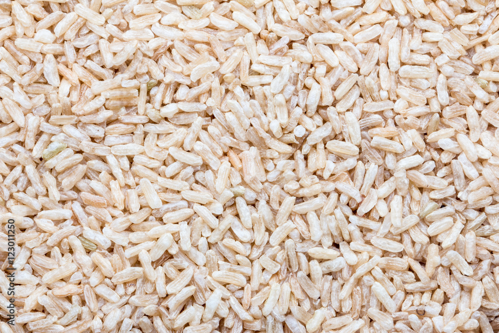 Brown rice uncooked for use as a background. Brown rice uncooked for use as a background.