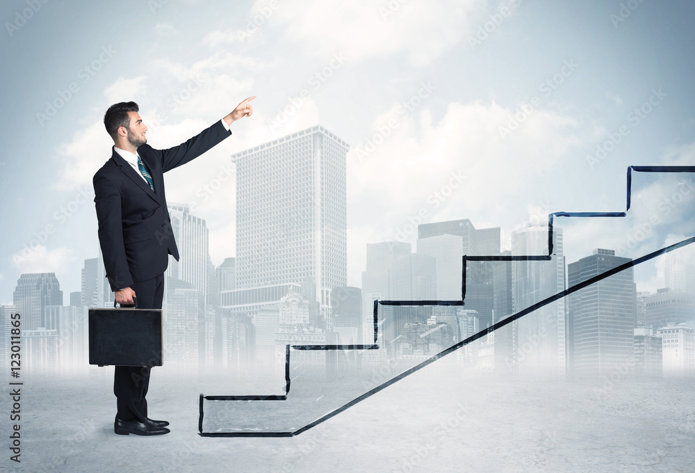 Business person in front of a staircase Business person in front of a staircase