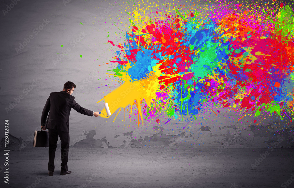 Sales person painting colorful splatter Sales person painting colorful splatter