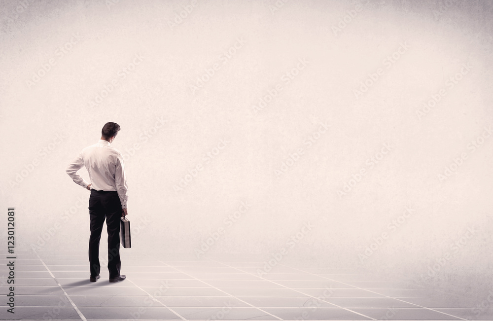 Business person standing in empty space Business person standing in empty space