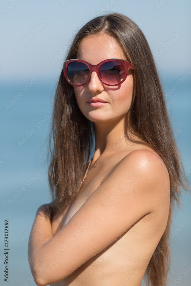 Portrait of long haired girl in sunglasses Portrait of long haired girl in sunglasses