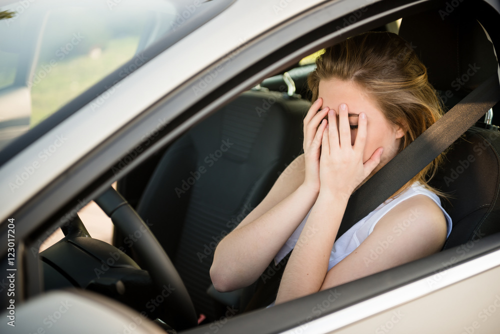 Worried woman in car Worried woman in car