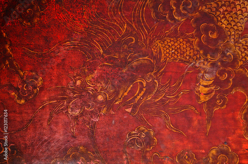 Red ancient old Asian Vietnamese dragon drawing background in Vietnam