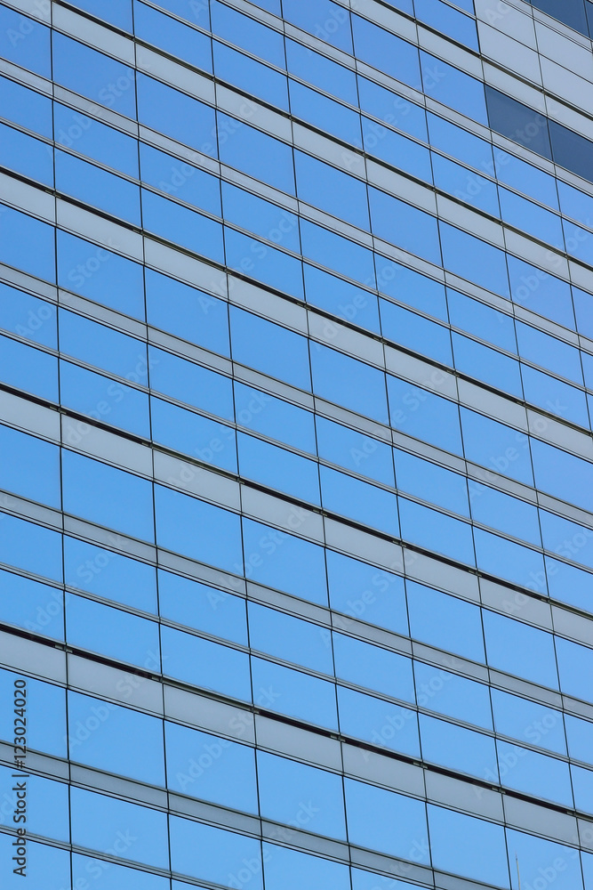 Background blue office glass windows in vertical frame Background blue office glass windows in vertical frame