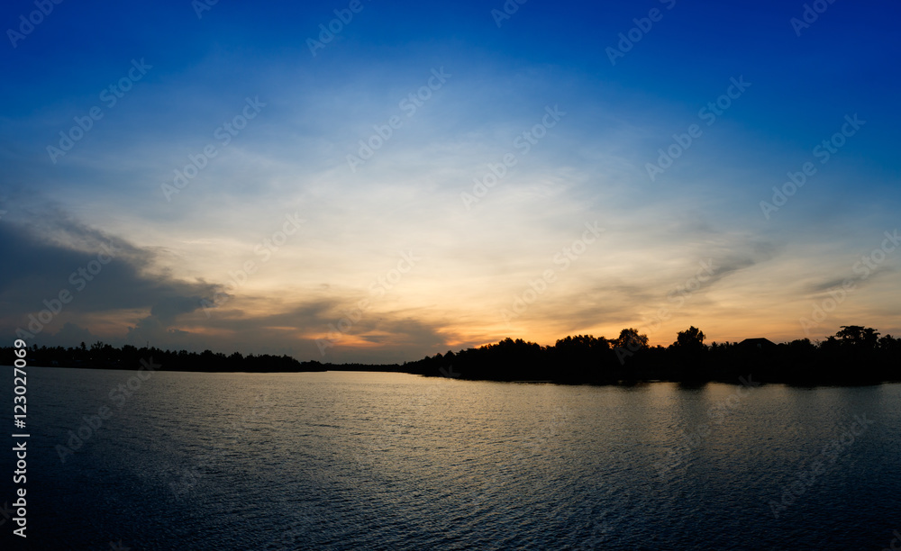 Beautiful sky sunset at Tapee river Suratthani Thailand