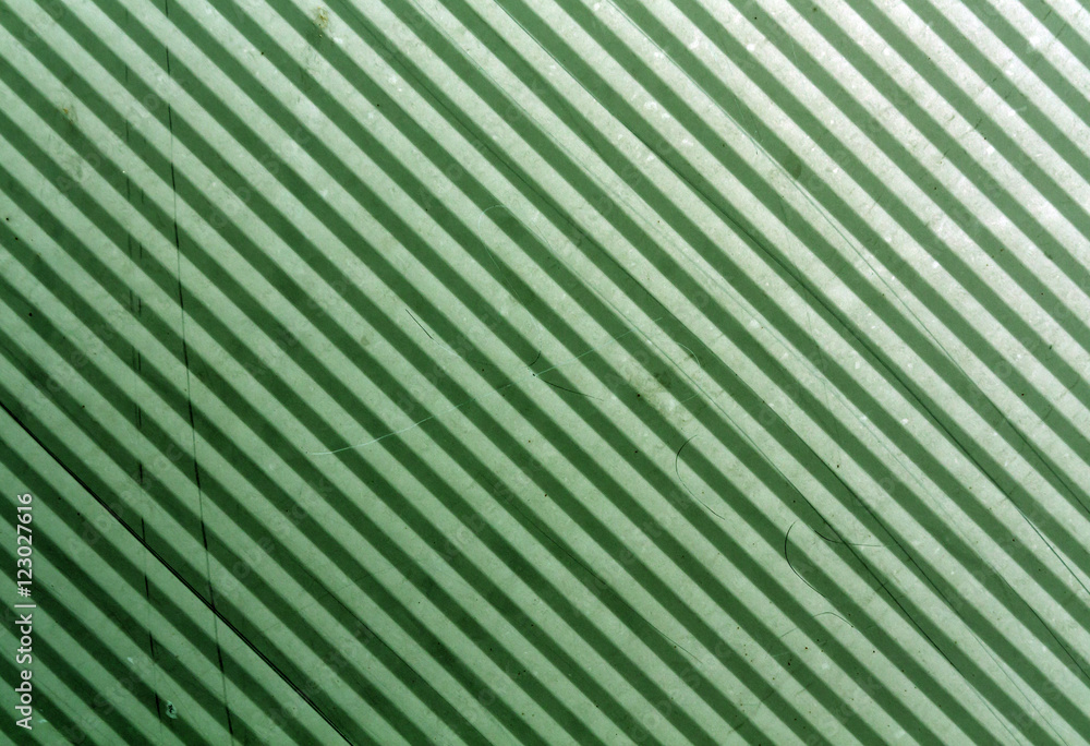 Green metal plate surface with scratches. Green metal plate surface with scratches.