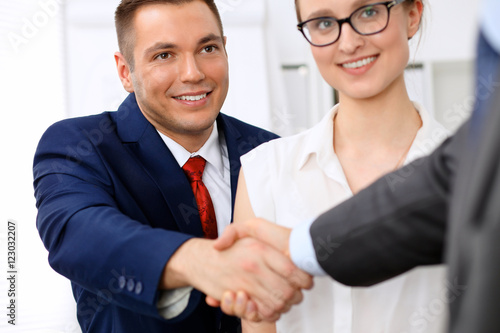 Two business man shaking hands to each other finishing up the meeting