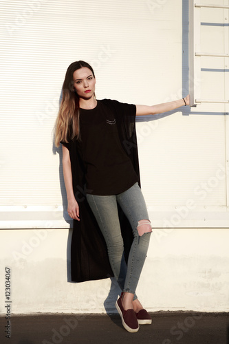 Portrait of a beautiful young girl in the Parking lot
