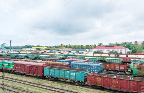 Railway freight cars are at the car-repair factory.