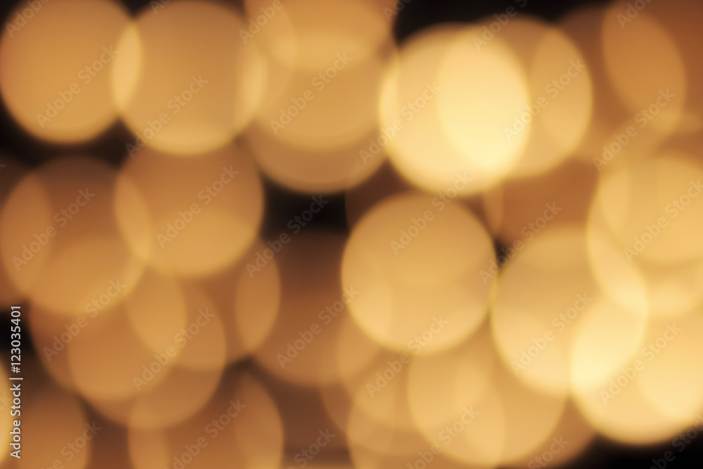 golden bokeh on a black background, abstract dark backdrop with defocused warm lights golden bokeh on a black background, abstract dark backdrop with defocused warm lights