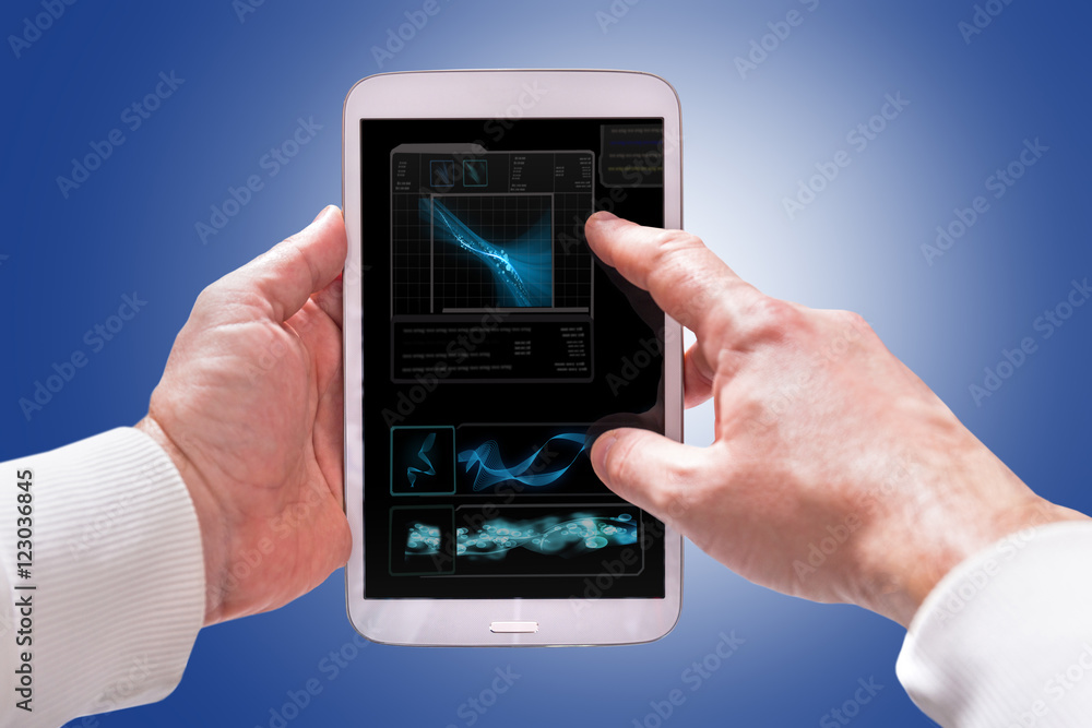Touchscreen tablet computer in hands with technology screen