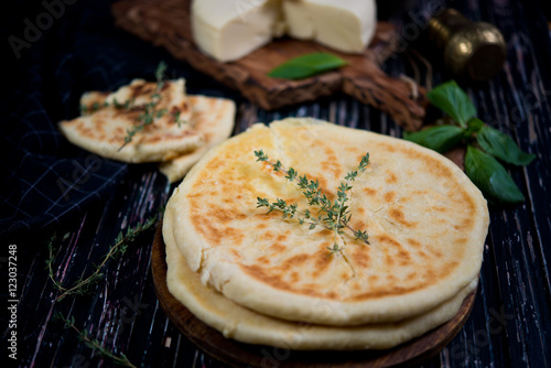 Traditional khachapuris with cheese
 photo