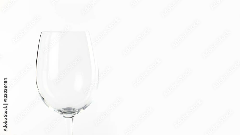 Red wine poured into glass Red wine poured into glass