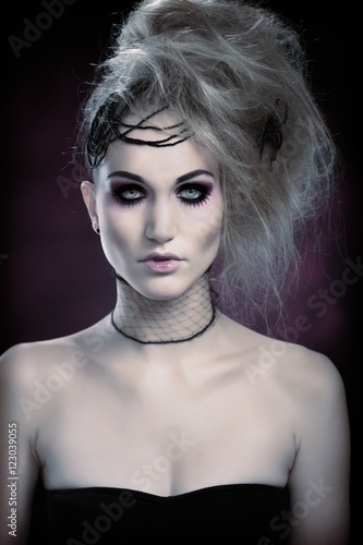 Decorative woman in spooky makeup