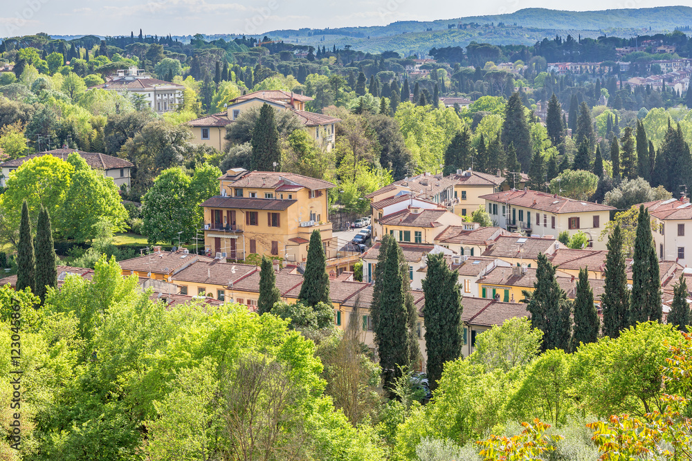 View of Italian village in forest landscape