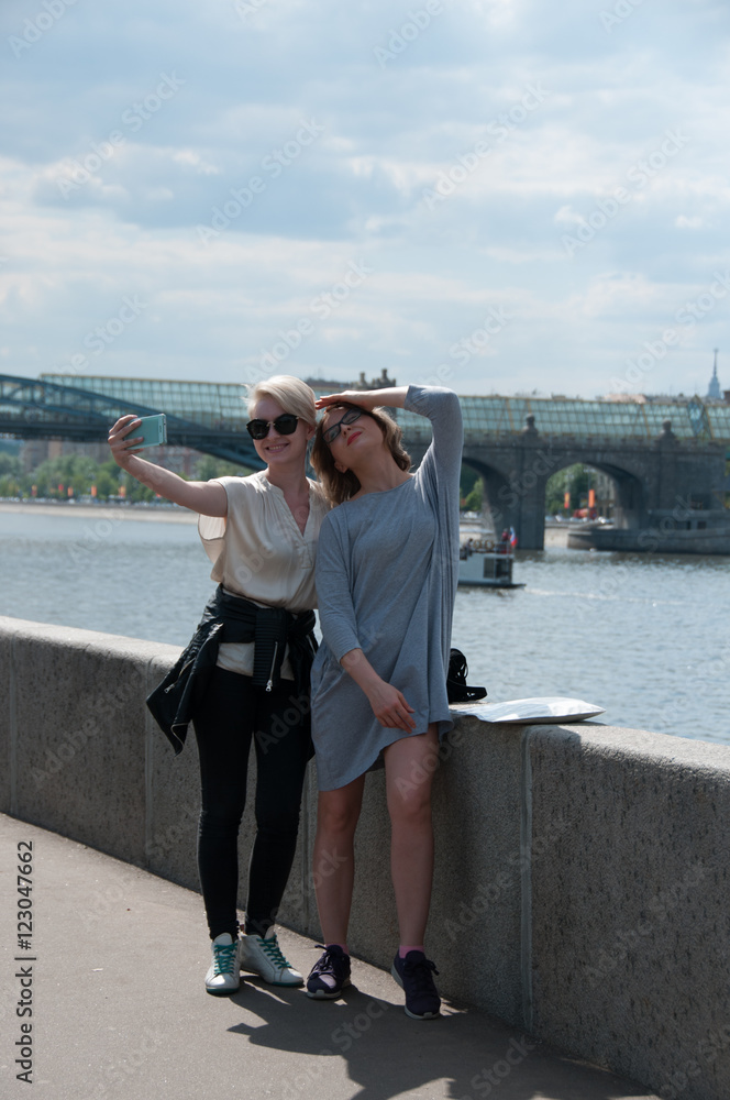 two girls doing selfie