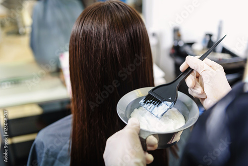 barber applying gel at barbershop