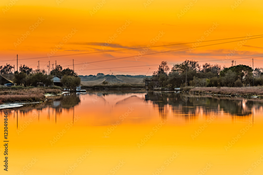 sunset on fishing trabuchets