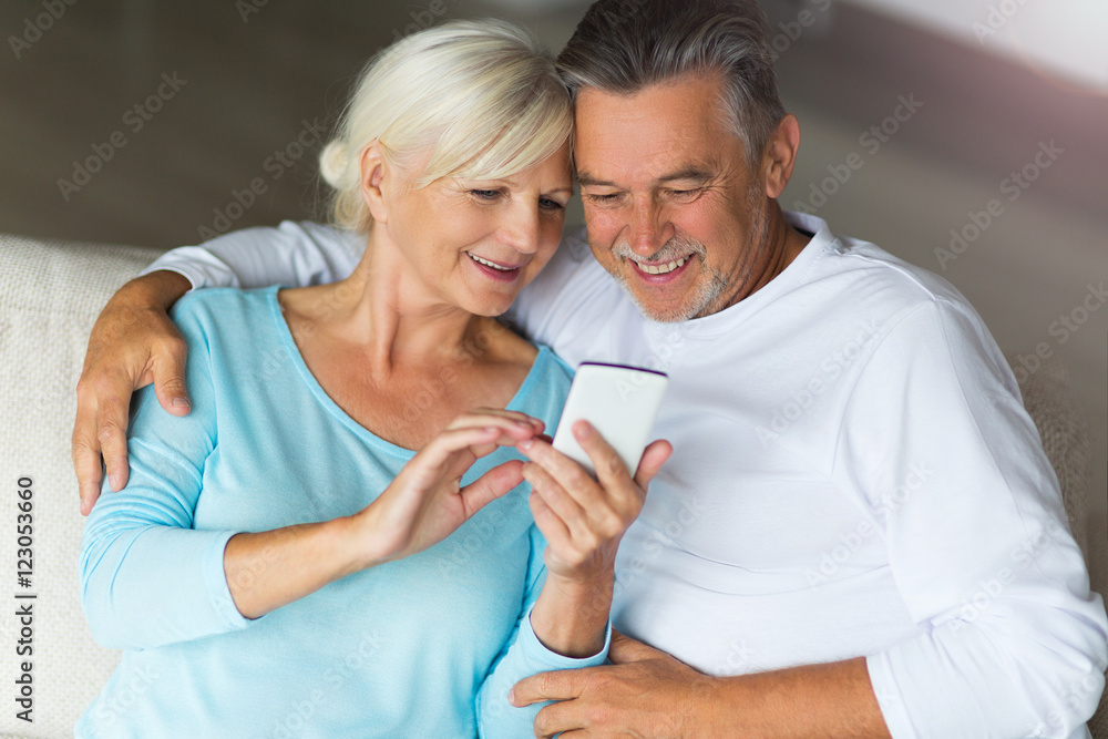 Senior couple using mobile phone
Senior couple using mobile phone